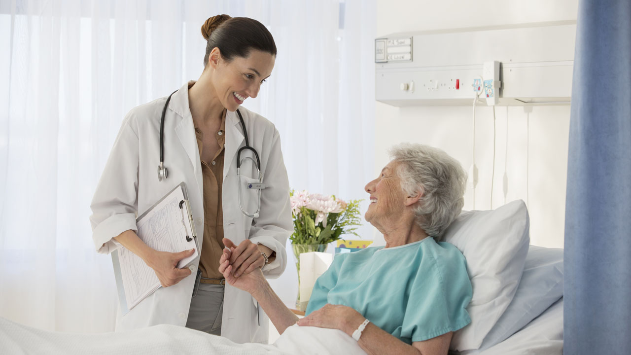 Doctor with elderly patient